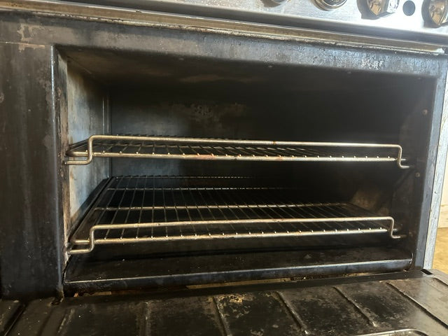 IMPERIAL COMMERCIAL NATURAL GAS 6 BURNER 24" GRIDDLE WITH DOUBLE OVEN ON CASTERS