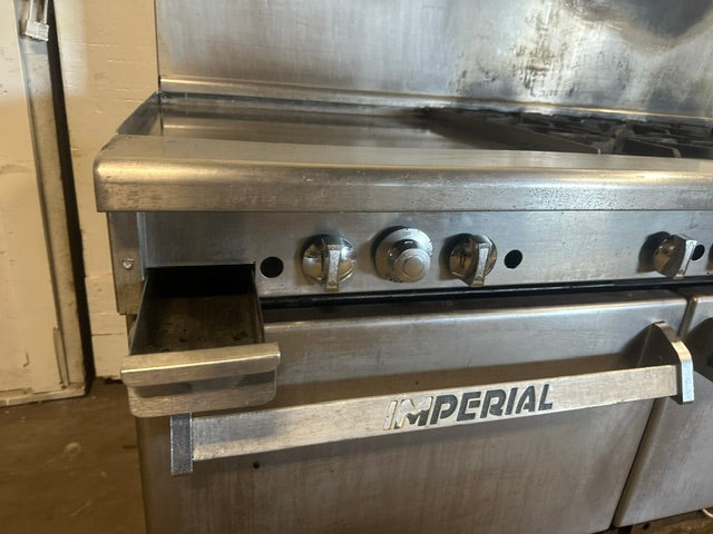 IMPERIAL COMMERCIAL NATURAL GAS 6 BURNER 24" GRIDDLE WITH DOUBLE OVEN ON CASTERS