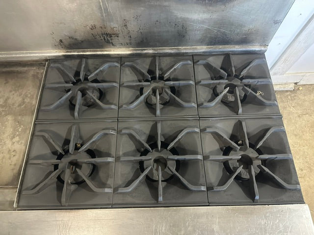 IMPERIAL COMMERCIAL NATURAL GAS 6 BURNER 24" GRIDDLE WITH DOUBLE OVEN ON CASTERS