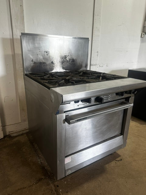 "GARLAND M44R" H.D NATURAL GAS COMMERCIAL 4 BURNERS STOVE WITH OVEN