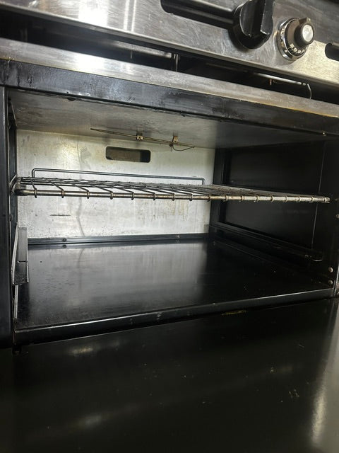 "AMERICAN RANGE"COMMERCIAL N GAS 60"W GRIDDLE WITH DOUBLE OVEN ON CASTERS