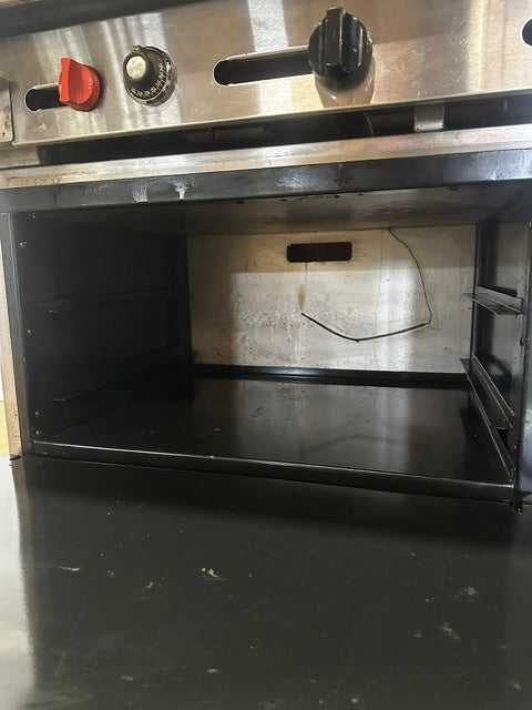 "AMERICAN RANGE"COMMERCIAL N GAS 60"W GRIDDLE WITH DOUBLE OVEN ON CASTERS
