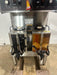 BUNN STAINLESS STEEL HEAVY DUTY COMMERCIAL COUNTER TOP DUAL COFFEE GRINDER/BREWER WITH WARMERS AND HOT WATER SPIGOT ON LEGS - Second Life - Equipment - collection_name