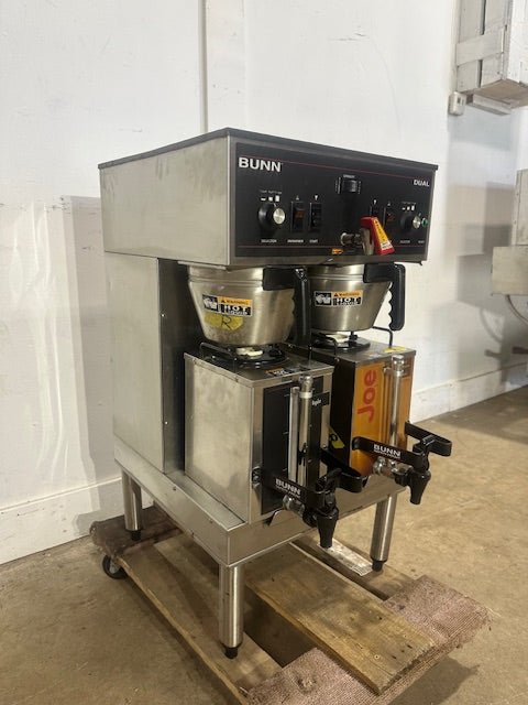 BUNN STAINLESS STEEL HEAVY DUTY COMMERCIAL COUNTER TOP DUAL COFFEE GRINDER/BREWER WITH WARMERS AND HOT WATER SPIGOT ON LEGS - Second Life - Equipment - collection_name