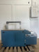 COMMERCIAL HEADYDUTY AUTO FEED HIGH SPEED POLY STRAPPING MACHINE - Second Life - Equipment - collection_name
