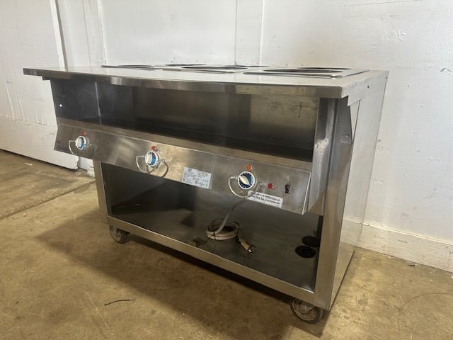 "DUKE DC - EP303 - 25SS M"208V ELECTRIC S.S 6 WELLS SOUP WARMER ON CASTERS - Second Life - Equipment - collection_name