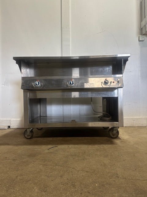 "DUKE DC - EP303 - 25SS M"208V ELECTRIC S.S 6 WELLS SOUP WARMER ON CASTERS - Second Life - Equipment - collection_name