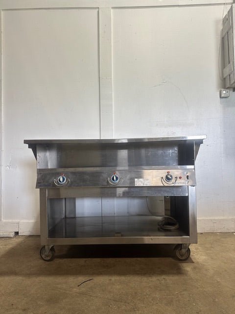 "DUKE DC - EP303 - 25SS M"208V ELECTRIC S.S 6 WELLS SOUP WARMER ON CASTERS - Second Life - Equipment - collection_name