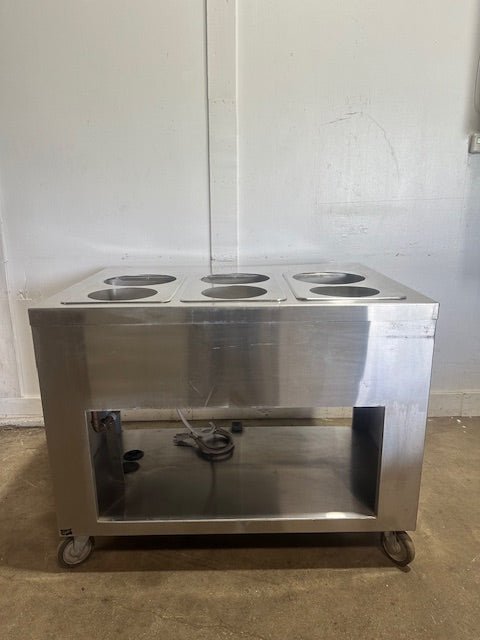 "DUKE DC - EP303 - 25SS M"208V ELECTRIC S.S 6 WELLS SOUP WARMER ON CASTERS - Second Life - Equipment - collection_name