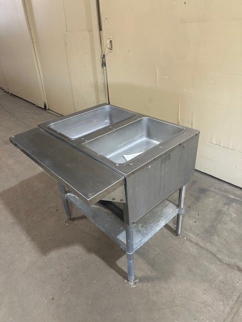 EAGLE GROUP 2 WELL STATIONARY GAS/PROPANE HOT FOOD TABLE WITH GALVANIZED SHELF AND ADJUSTABLE LEGS - Bargains R Ours - #collection_name#