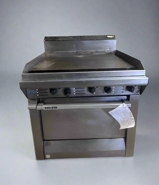 GARLAND HEAVY DUTY STAINLESS STEEL COMMERCIAL GRIDDLE/GRILL WITH STANDARD OVEN BASE ON CASTERS 33000BTU/HR OVEN 40000BTU/HR - Bargains R Ours - #collection_name#