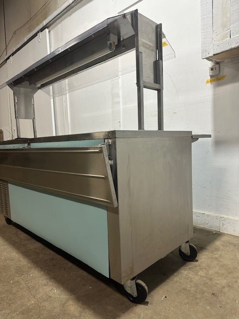 H.D COMMERCIAL S.S REFRIGERATED BUFFET TABLE W/SNEEZE GUARD ON CASTERS,120V 1PH - Second Life - Equipment - collection_name