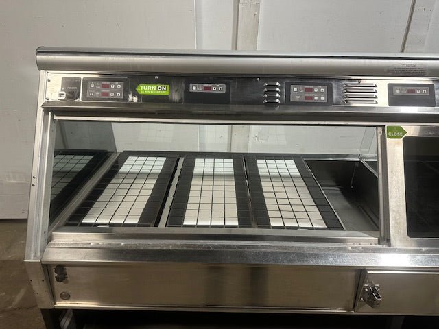 "HENNY PENNY MPB - 107" 208V 7 WELLS DUAL SERVICE HOT FOOD DISPLAY CASE,95.5"W - Second Life - Equipment - collection_name