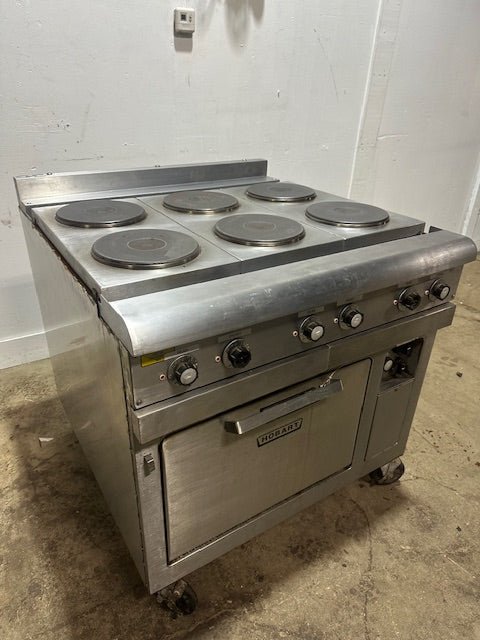 "HOBART CR43" 6 BURNERS DUAL PHASE ELECTRIC STOVE/RANGE W/OVEN AND 2 DRIP TRAYS ON CASTERS - Second Life - Equipment - collection_name