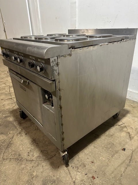 "HOBART CR43" 6 BURNERS DUAL PHASE ELECTRIC STOVE/RANGE W/OVEN AND 2 DRIP TRAYS ON CASTERS - Second Life - Equipment - collection_name