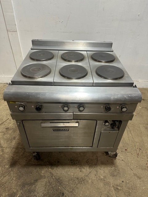 "HOBART CR43" 6 BURNERS DUAL PHASE ELECTRIC STOVE/RANGE W/OVEN AND 2 DRIP TRAYS ON CASTERS - Second Life - Equipment - collection_name