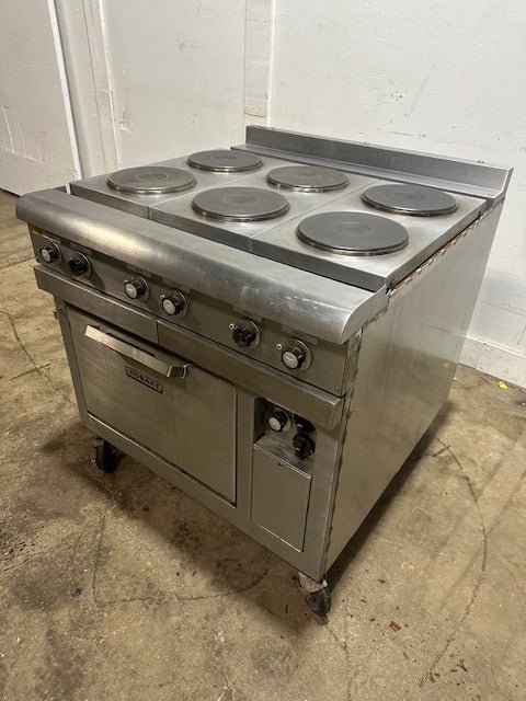 "HOBART CR43" 6 BURNERS DUAL PHASE ELECTRIC STOVE/RANGE W/OVEN AND 2 DRIP TRAYS ON CASTERS - Second Life - Equipment - collection_name