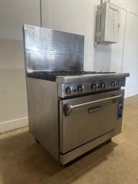 IMPERIAL COMMERCIAL NAT GAS 6 BURNER STAINLESS STEEL RANGE W/ CONVECTION OVEN - Second Life - Equipment - collection_name