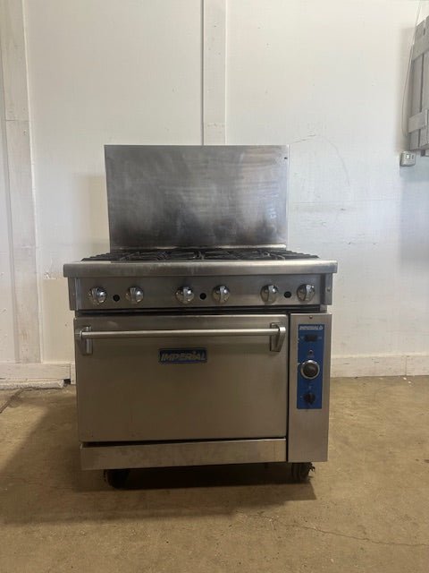 IMPERIAL COMMERCIAL NAT GAS 6 BURNER STAINLESS STEEL RANGE W/ CONVECTION OVEN - Second Life - Equipment - collection_name