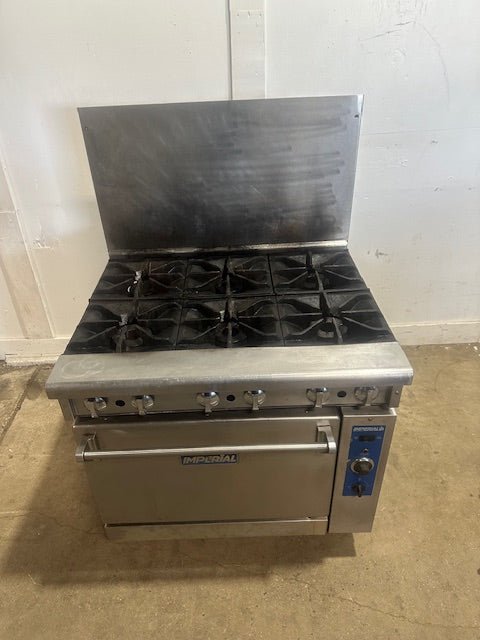 IMPERIAL COMMERCIAL NAT GAS 6 BURNER STAINLESS STEEL RANGE W/ CONVECTION OVEN - Second Life - Equipment - collection_name