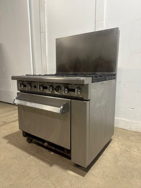 "IMPERIAL" NATURAL GAS HEAVY DUTY COMMERCIAL 6 BURNER STOVE WITH OVEN ON CASTERS - Second Life - Equipment - collection_name