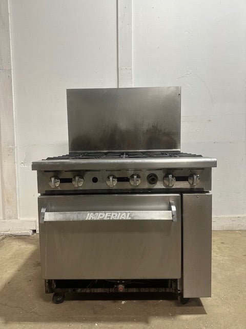 "IMPERIAL" NATURAL GAS HEAVY DUTY COMMERCIAL 6 BURNER STOVE WITH OVEN ON CASTERS - Second Life - Equipment - collection_name