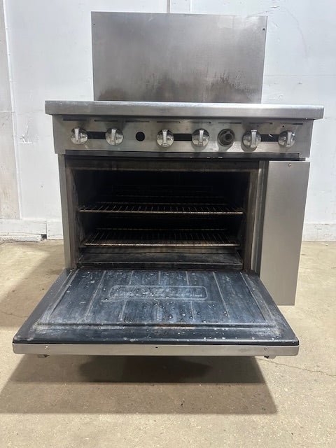 "IMPERIAL" NATURAL GAS HEAVY DUTY COMMERCIAL 6 BURNER STOVE WITH OVEN ON CASTERS - Second Life - Equipment - collection_name