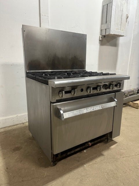 "IMPERIAL" NATURAL GAS HEAVY DUTY COMMERCIAL 6 BURNER STOVE WITH OVEN ON CASTERS - Second Life - Equipment - collection_name