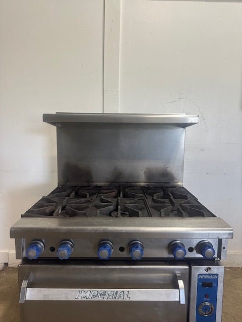 "IMPERIAL"COMMERCIAL N GAS 12" x 12" 6 BURNERS STOVE/RANGE WITH OVEN ON CASTERS - Second Life - Equipment - collection_name