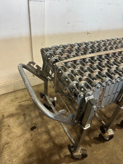 NESTAFLEX 226 SKATE WHEEL CONVEYOR 74"L x 27"H (COMPRESS) - 299"L x 46"H(EXPAND), 2"d steel wheels. - Second Life - Equipment - collection_name