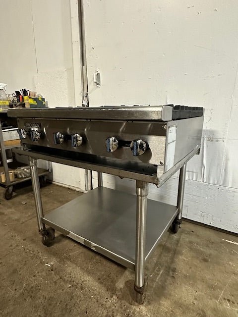 "RADIANCE "N GAS 36"W 6 BURNER HOTPLATE ON ROLLING TABLE STAND,37"H x 30 1/8"D - Second Life - Equipment - collection_name