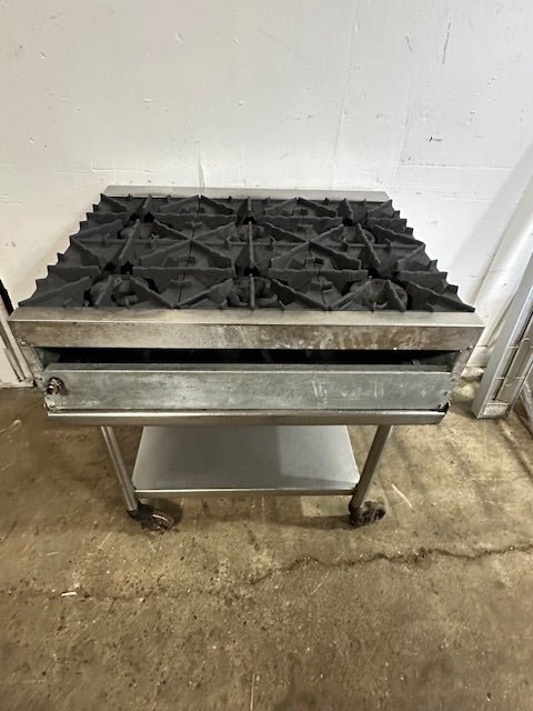 "RADIANCE "N GAS 36"W 6 BURNER HOTPLATE ON ROLLING TABLE STAND,37"H x 30 1/8"D - Second Life - Equipment - collection_name