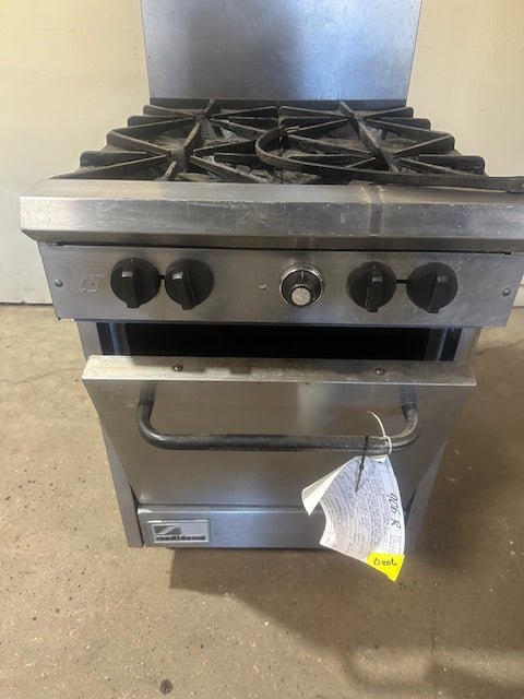 SOUTHBEND NATURAL GAS 4 BURNER STOVE WITH OVEN ON LEGS TALL BACK SPLASH GUARD AND GREASE CATCHER - Bargains R Ours - #collection_name#