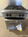 SOUTHBEND NATURAL GAS 4 BURNER STOVE WITH OVEN ON LEGS TALL BACK SPLASH GUARD AND GREASE CATCHER - Bargains R Ours - #collection_name#